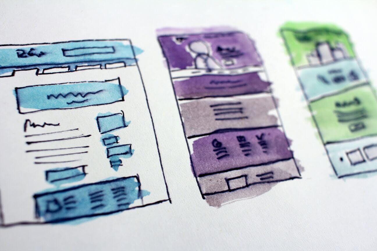 design image with drawn wireframes of an app